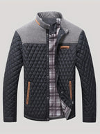 Men's black quilted jacket with tweed trim, back view