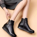 Women's black cozy buckle ankle boots with cushioned insole