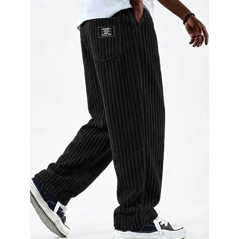 Men's black ribbed knit wide-leg sweatpants, back view