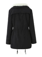 Women's black faux fur-trimmed hooded winter parka, back view