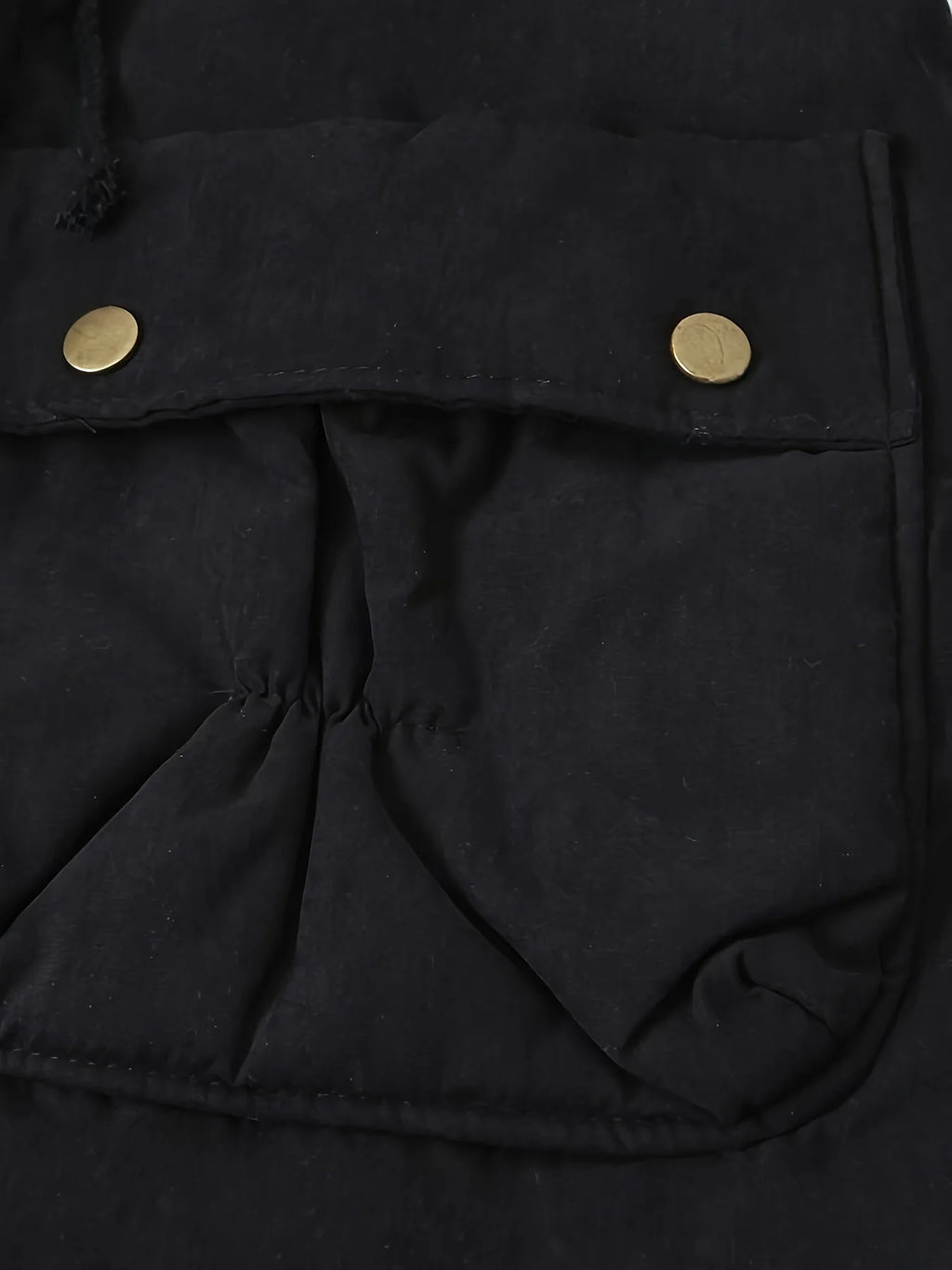 Women's black faux fur-trimmed hooded winter parka, cargo pocket detail