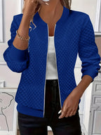 Women's blue quilted bomber jacket with ribbed collar