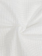 Women's white quilted bomber jacket fabric detail