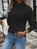 Women's black chunky cable knit turtleneck sweater, back view