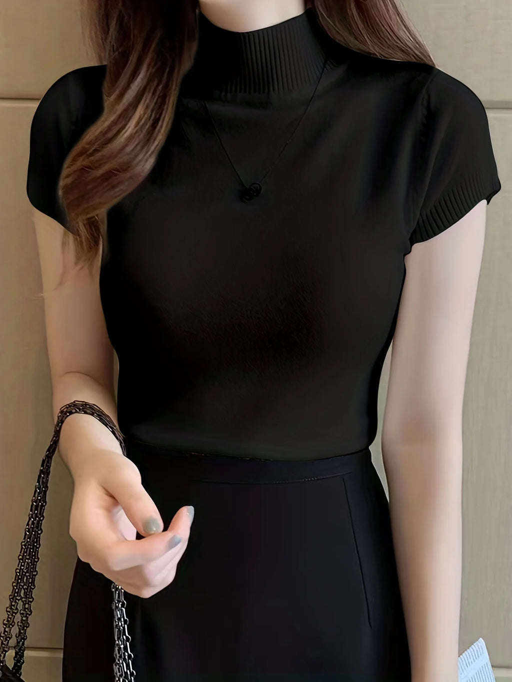 Women's black ribbed mock neck top, fitted short sleeve style
