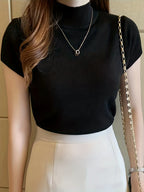 Women's black ribbed mock neck top, fitted short sleeve style