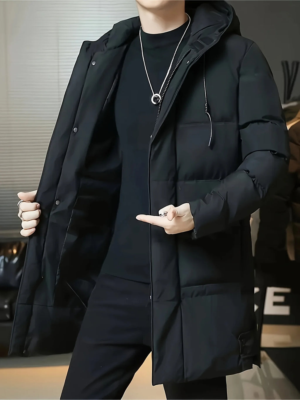 Men's black hooded longline puffer coat, zipped front view
