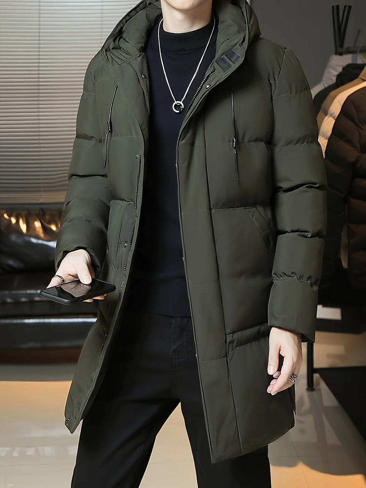 Men's green hooded longline puffer coat, quilted front view
