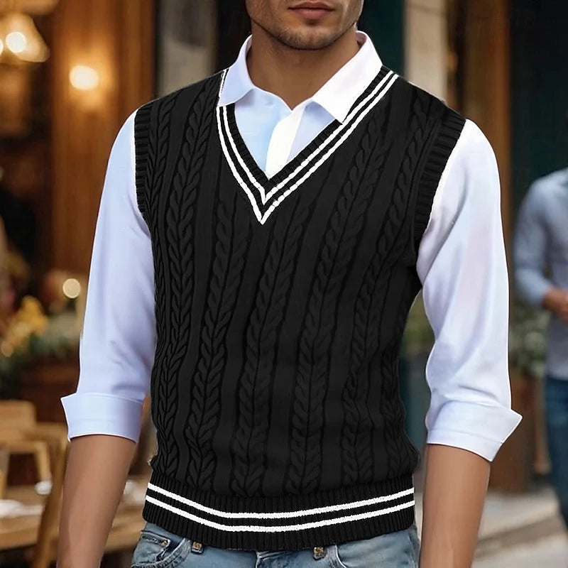 Men's black cable knit sweater vest with striped V-neck trim