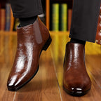 Men's black polished ankle chelsea boots with smooth pull-tab heel