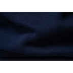 Men's navy blue fair isle zip-up knit cardigan with ribbed cuffs