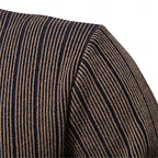 Close-up of khaki striped ribbed knit on men's mock neck sweater