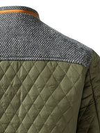 Men's fern green quilted stand-collar jacket with snap-front closure