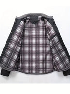 Men's black quilted stand-collar jacket with snap-front closure