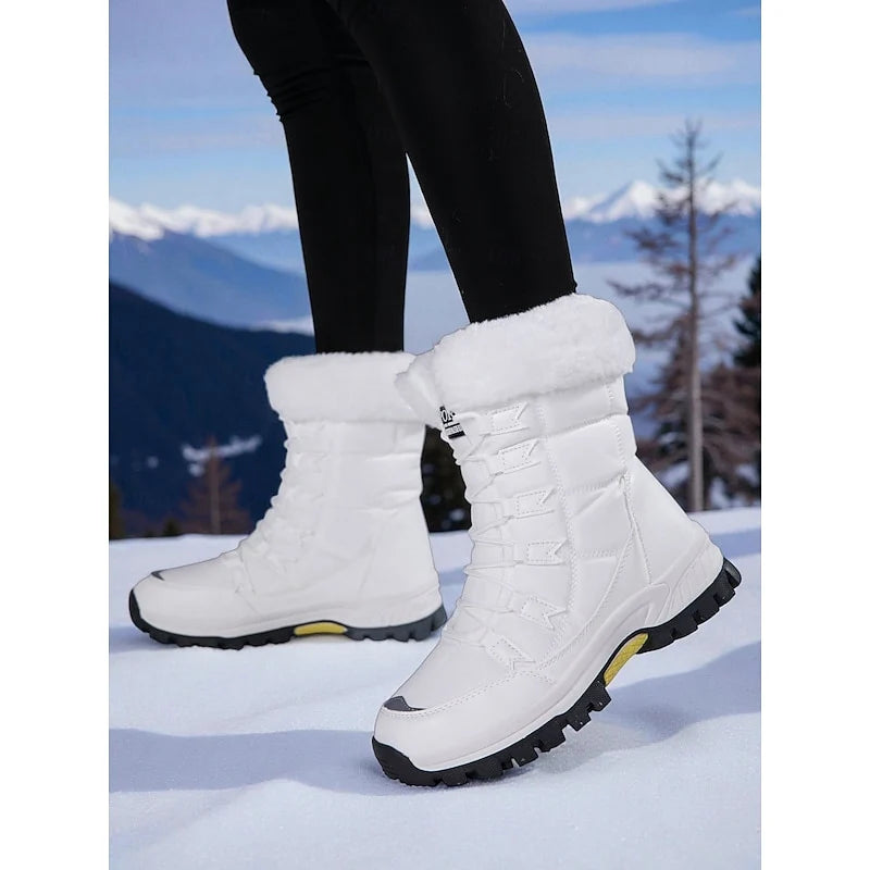 Women's white cozy insulated lace-up winter boots with pull-tab heel