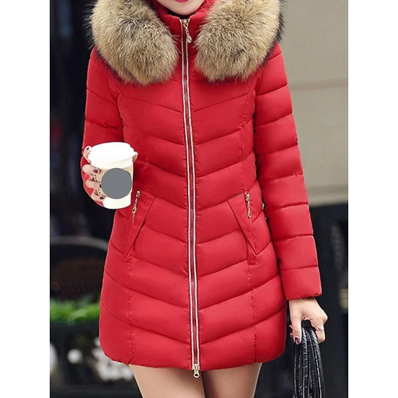 Women's red hooded puffer coat, close-up of faux fur hood