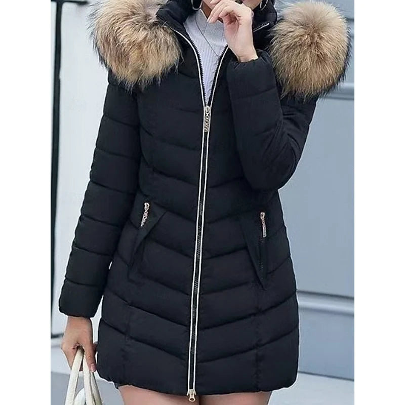Women's black hooded quilted puffer coat with faux fur trim