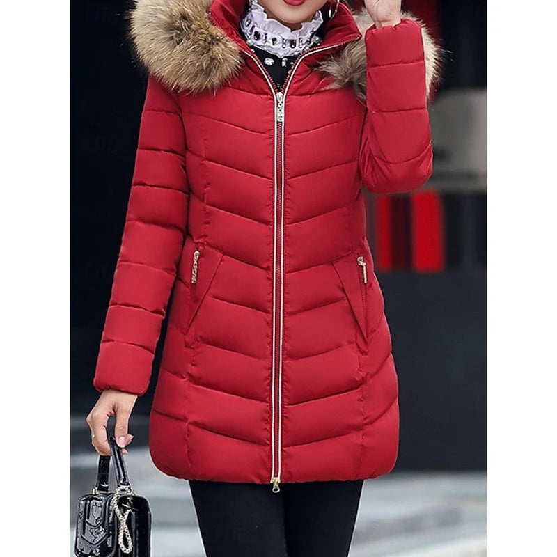 Women's red hooded puffer coat, full length front view outdoors
