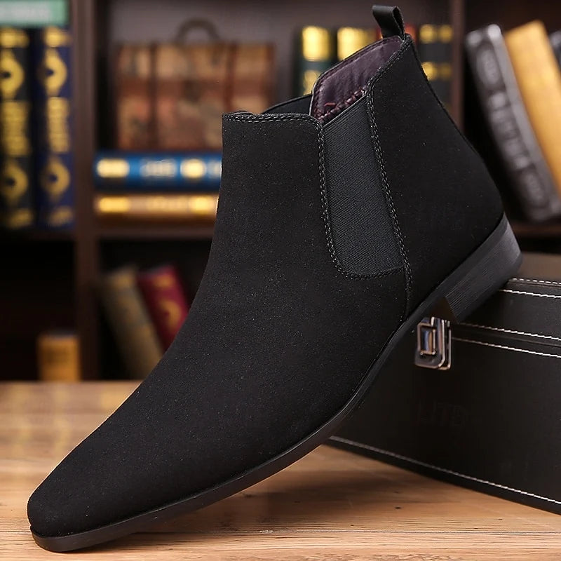 Men's black slip-on ankle chelsea boots, with elastic side panels