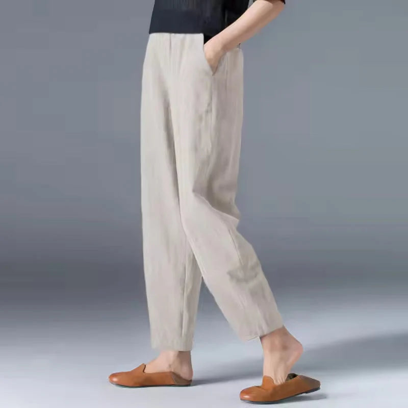 Women's gray tapered harem linen pants with an elastic waist