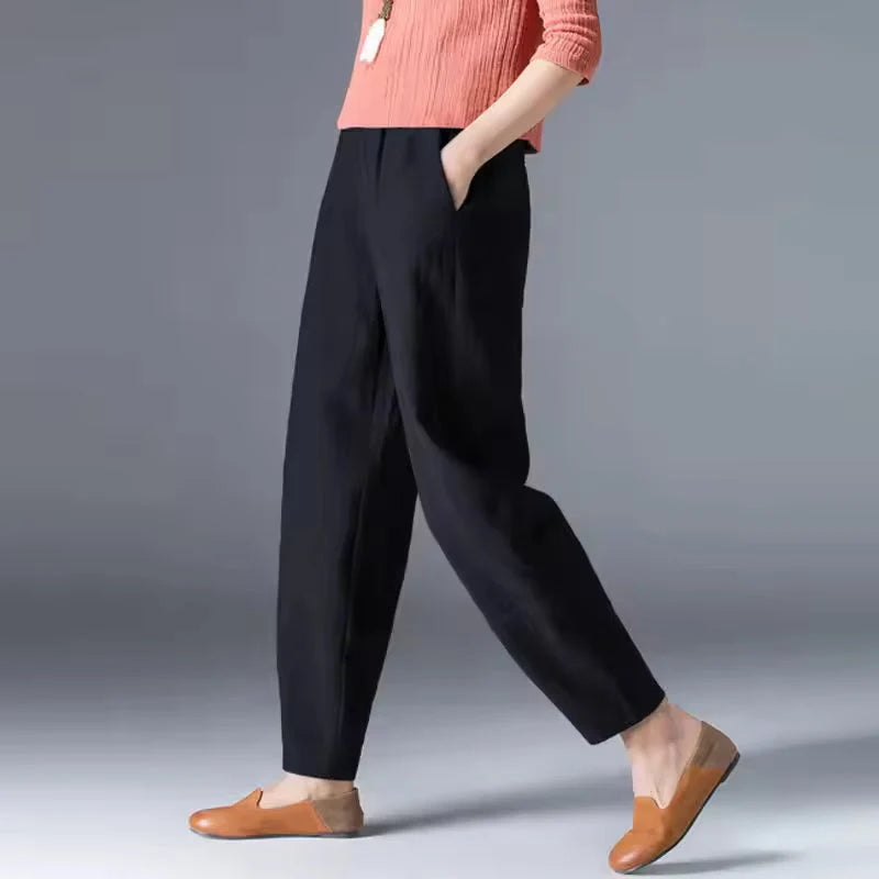 Women's black tapered harem linen pants with elastic waist