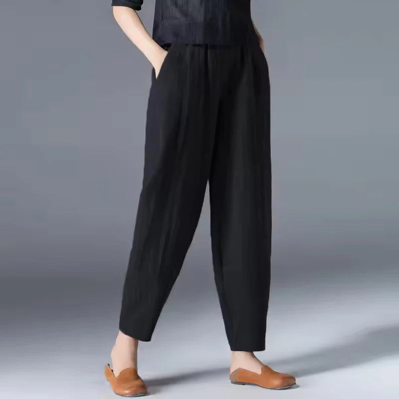 Women's black tapered harem linen pants with elastic waist