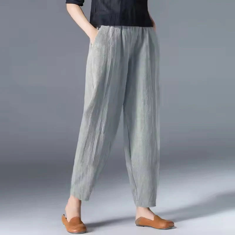 Women's gray tapered harem linen pants with an elastic waist