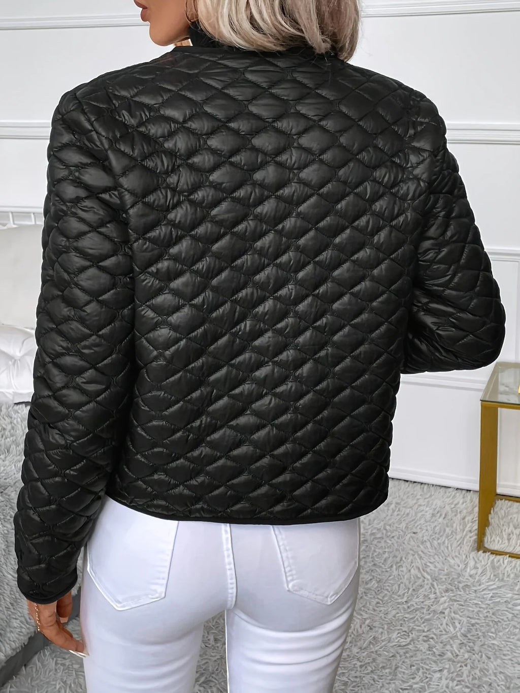 Women's black diamond quilted jacket with button front