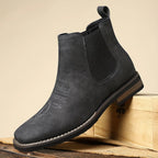 Men's black classic pull-on chelsea boots, with stretch side panels