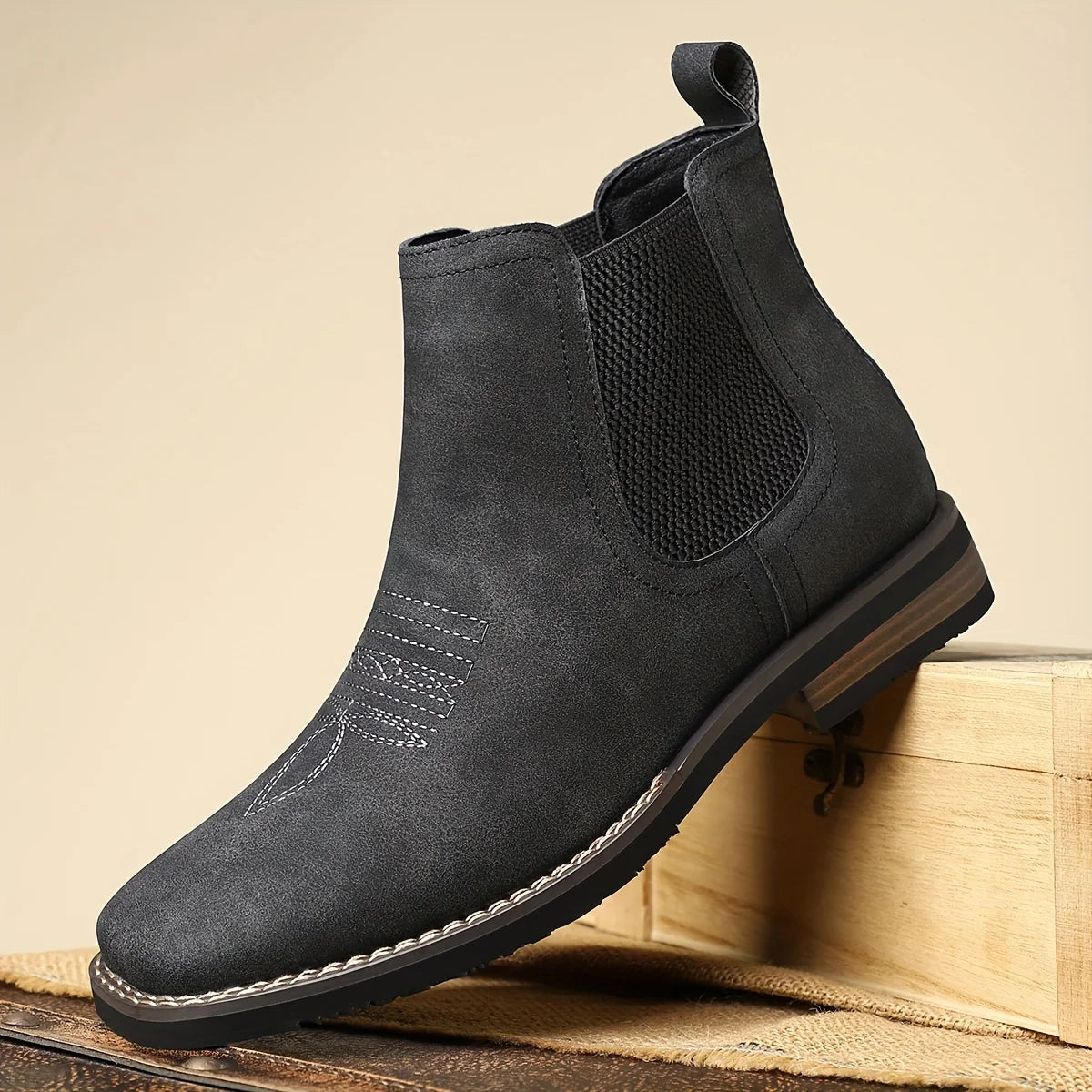 Men's black classic pull-on chelsea boots, with stretch side panels