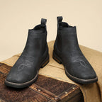 Men's black classic pull-on chelsea boots, with stretch side panels
