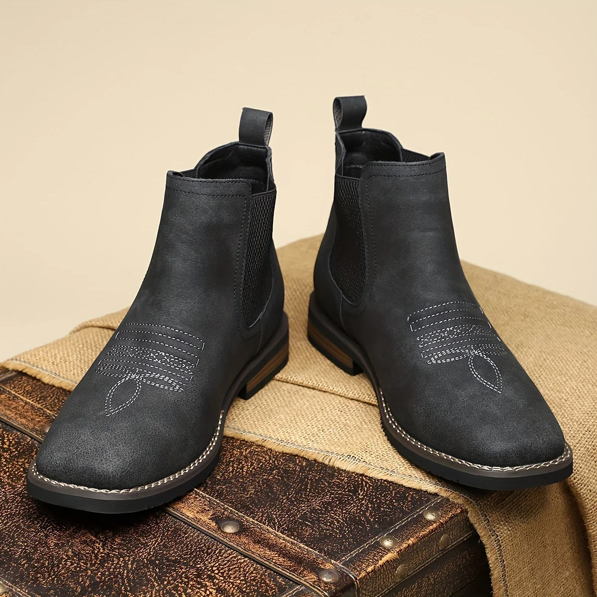 Men's black classic pull-on chelsea boots, with stretch side panels