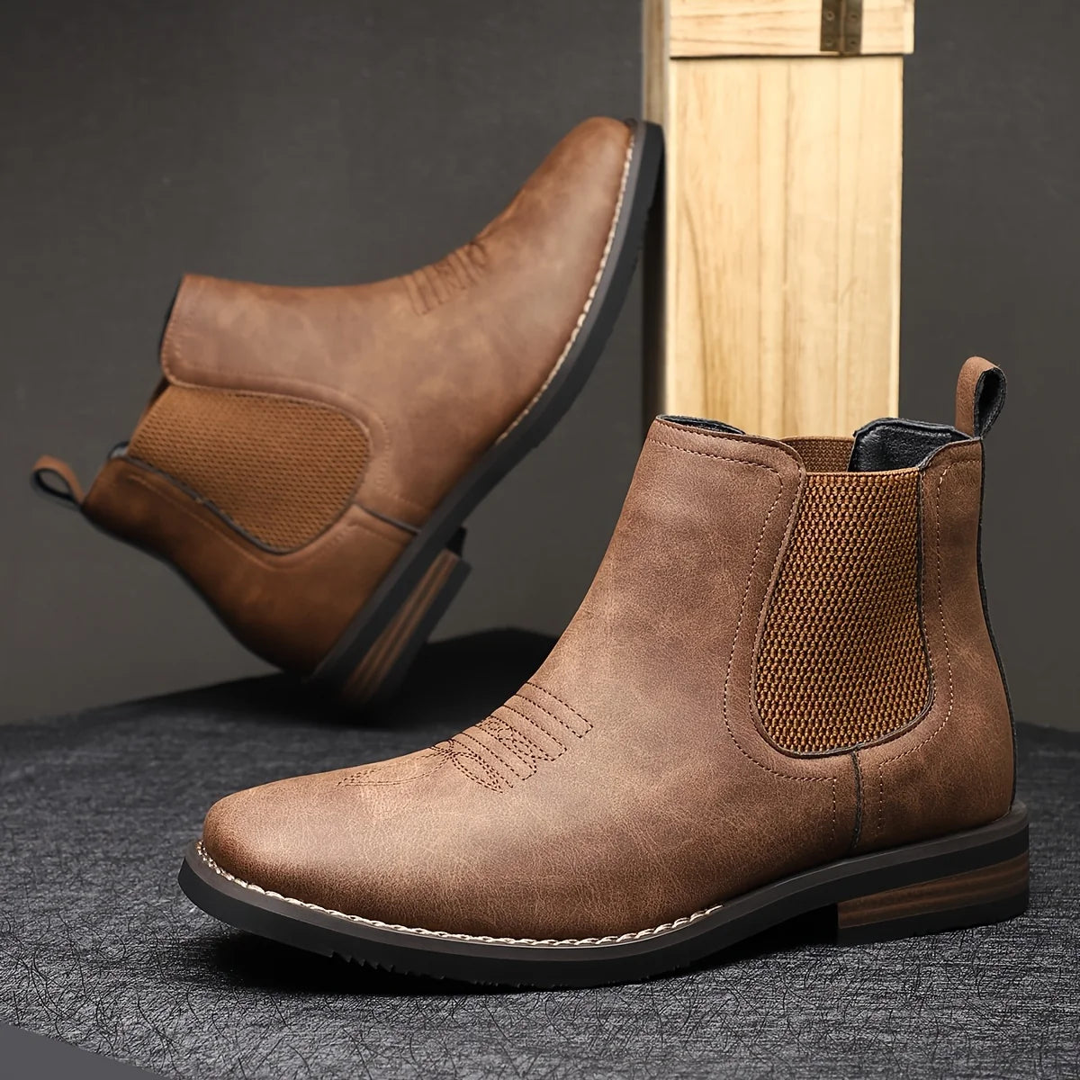 Men's black classic pull-on chelsea boots, with stretch side panels
