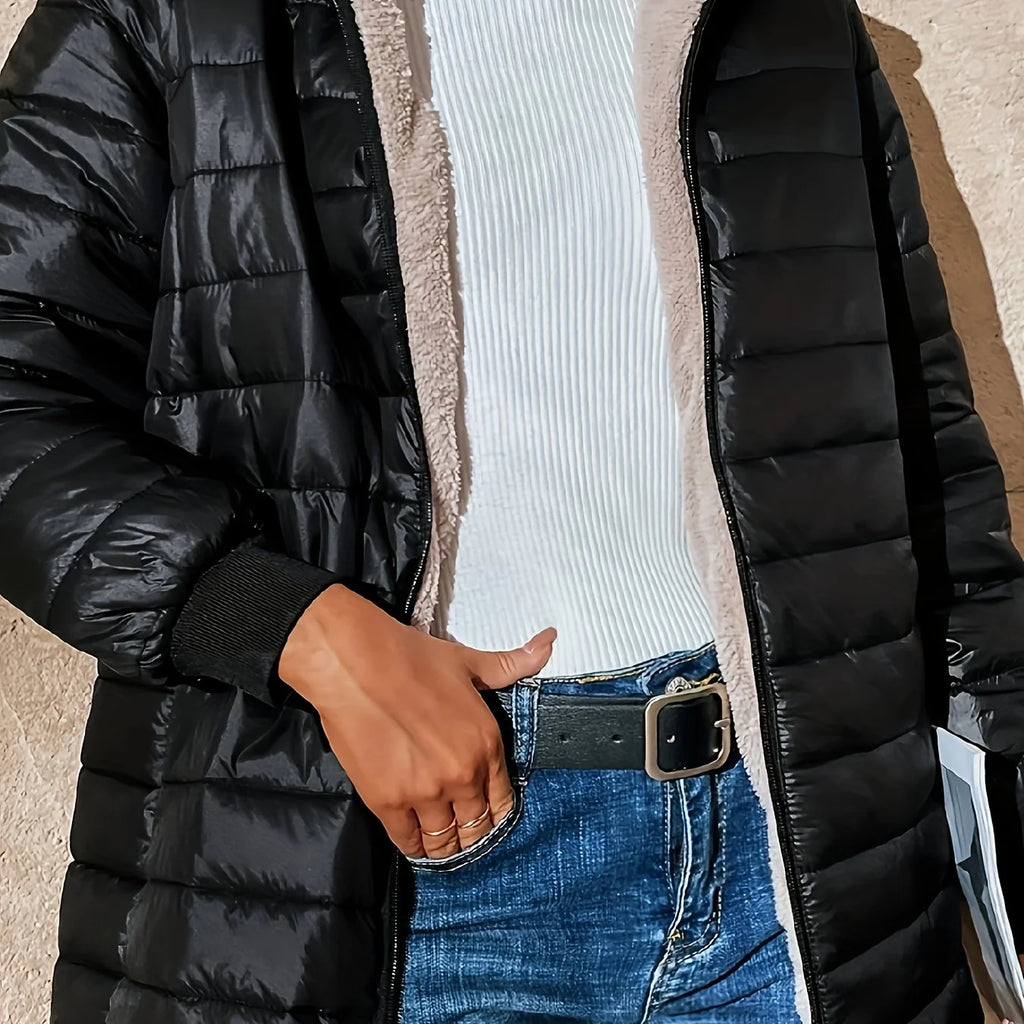 Women's black quilted longline puffer coat with relaxed silhouette