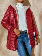 Women's burgundy quilted longline puffer coat with relaxed silhouette