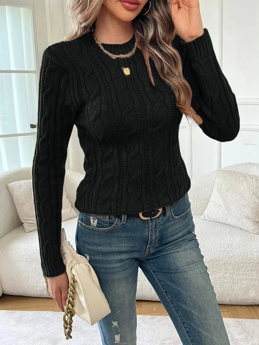 Women's black classic twist-knit sweater, with a ribbed hem