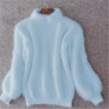 Women's blue soft ribbed mock-neck sweater for chilly days