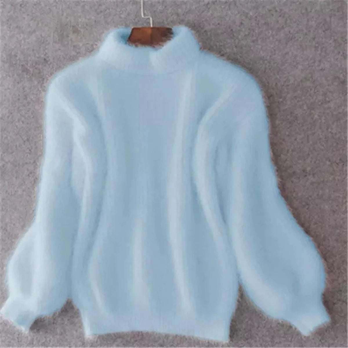 Women's blue soft ribbed mock-neck sweater for chilly days