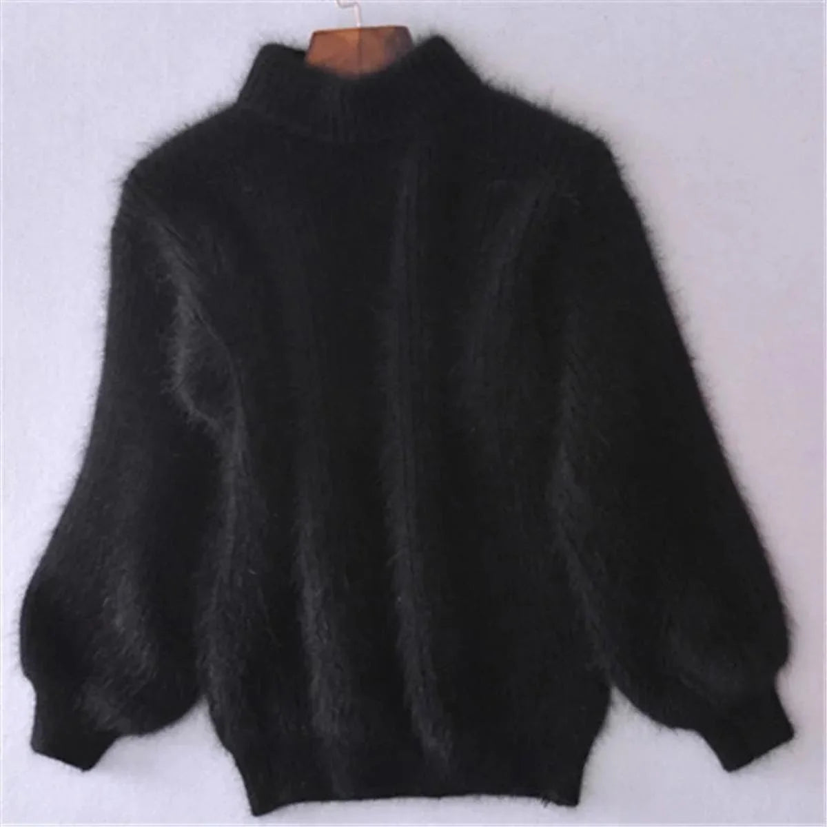 Women's black soft ribbed mock-neck sweater for chilly days
