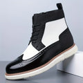 Men's black two-tone wingtip ankle boot with side zip
