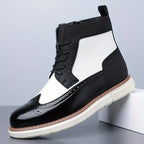 Men's black two-tone wingtip ankle boot with side zip