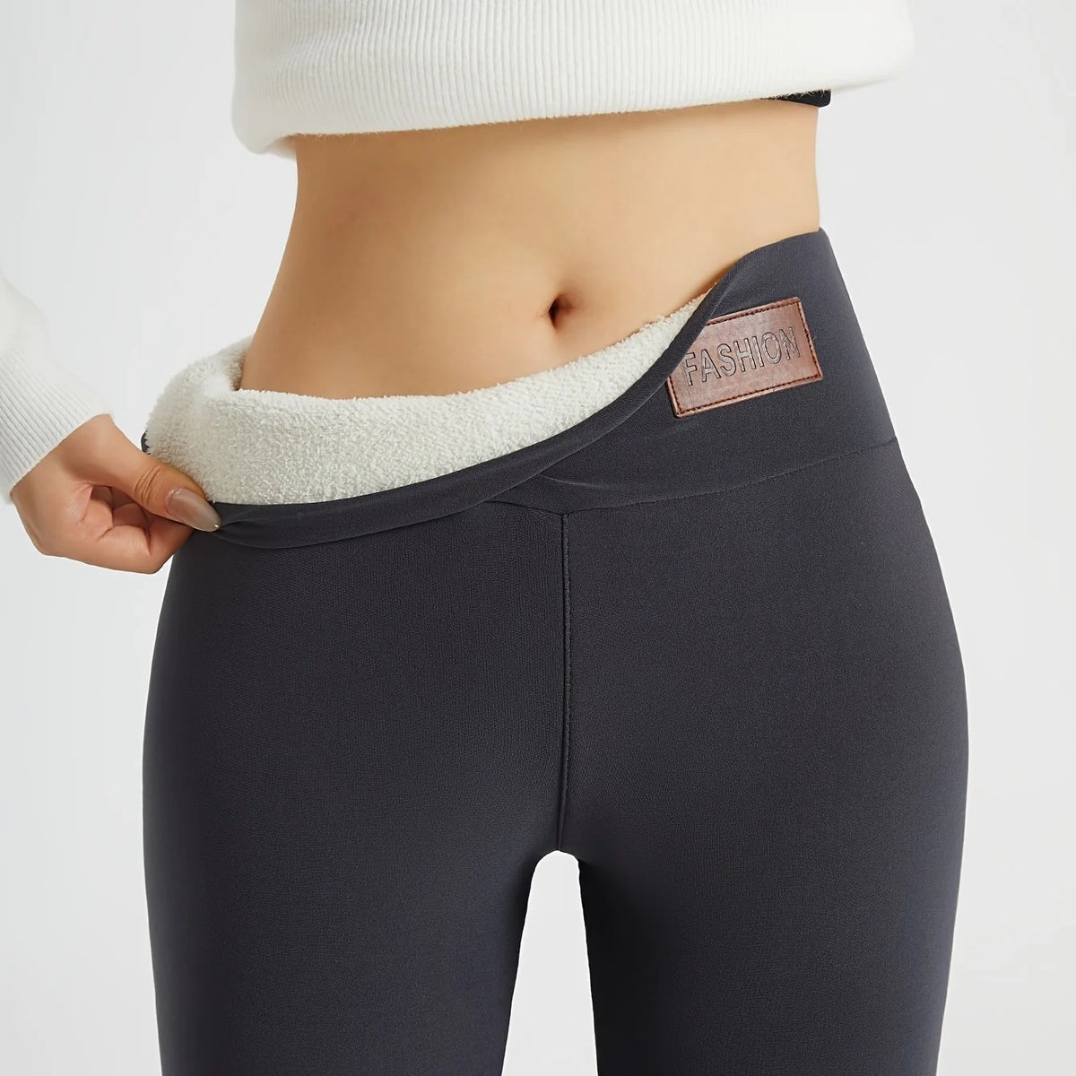 Women's dark gray high-waist fleece-lined skinny leggings for winter, waistband detail