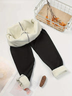 Women's black high-waist fleece-lined skinny leggings for winter