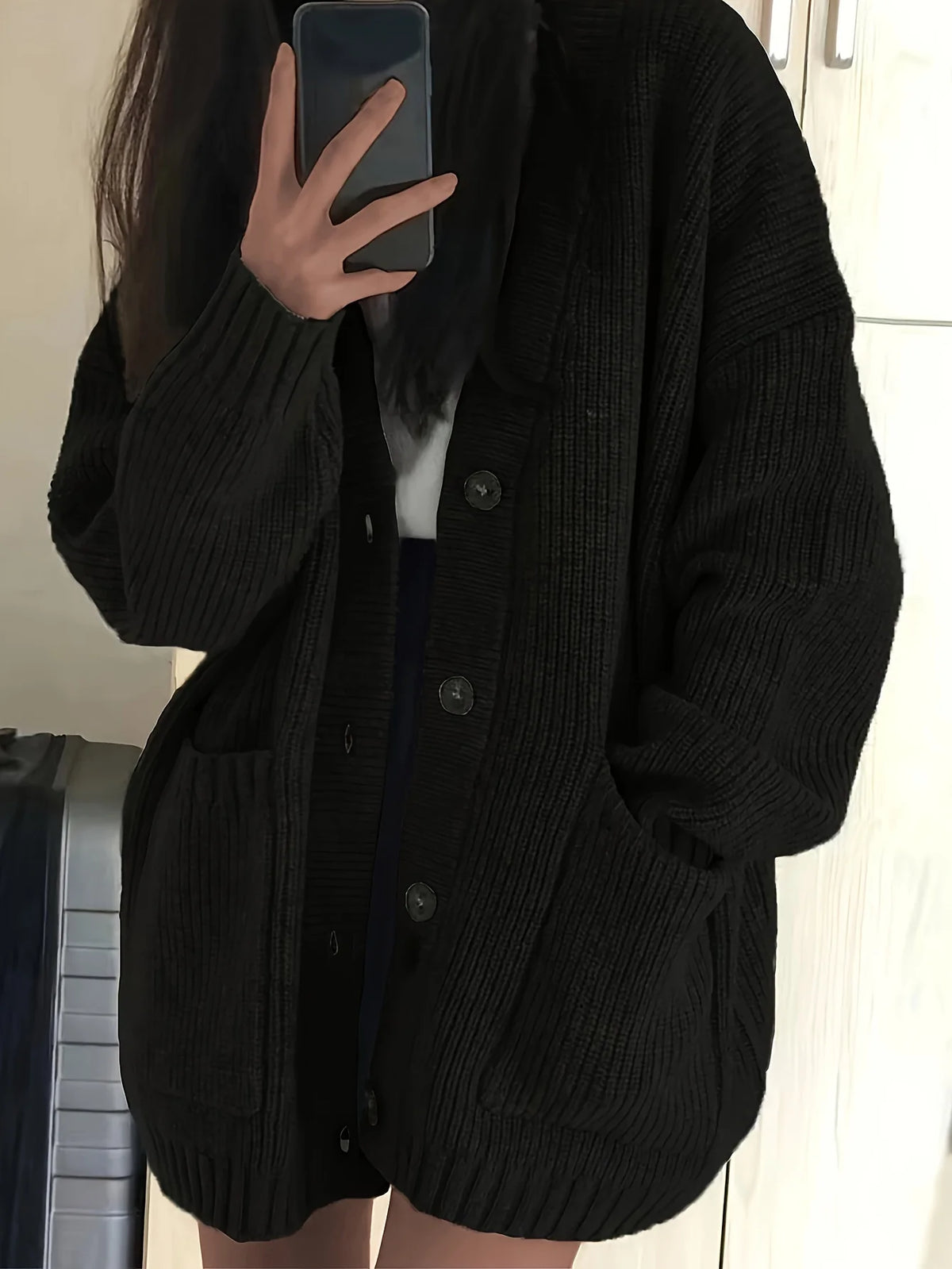 Women's black oversized button-front cardigan