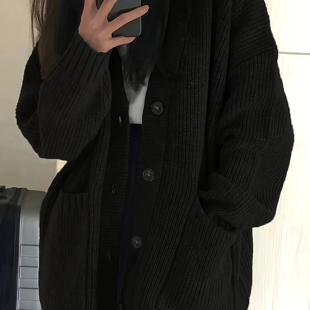 Women's black oversized button-front cardigan