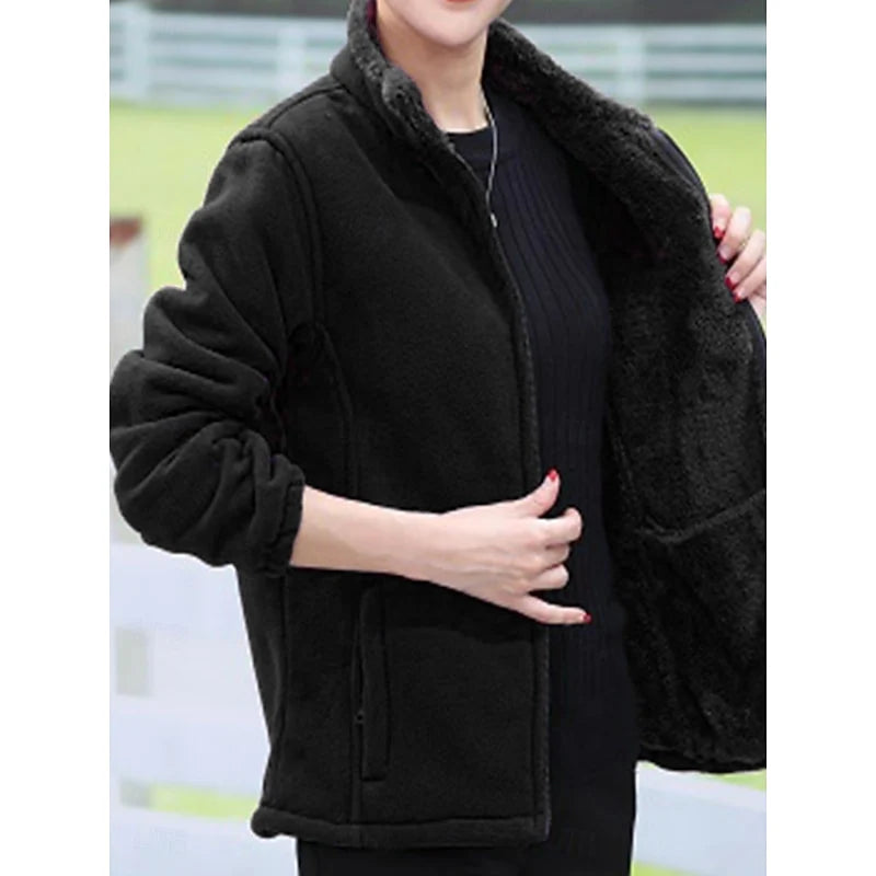 Women's black relaxed-fit stand-collar jacket with full-zip closure