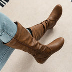 Women's black slouched mid-calf boots with relaxed pull-on fit
