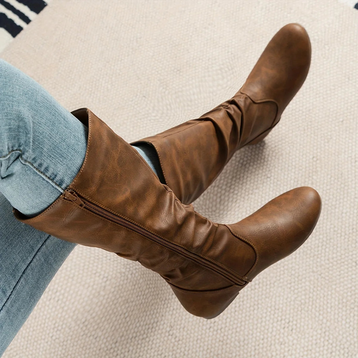 Women's black slouched mid-calf boots with relaxed pull-on fit