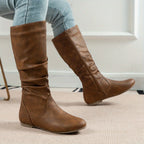 Women's black slouched mid-calf boots with relaxed pull-on fit