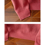 Men's red argyle crew neck sweater with saddle shoulders